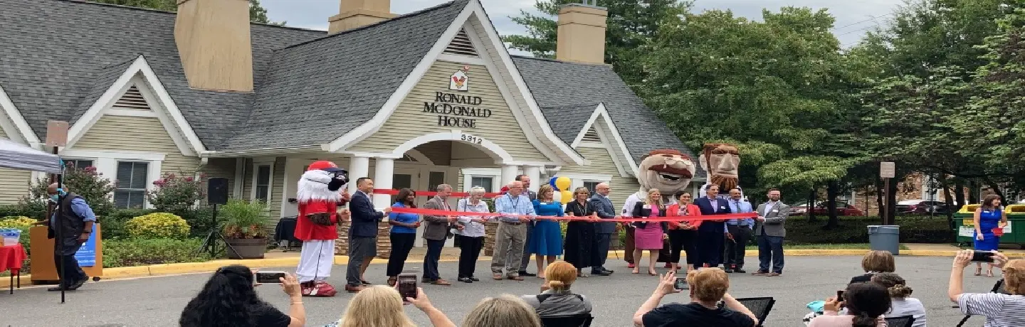 The landscape of the Ronald McDonald House includes the entryway filled with lush shrubs