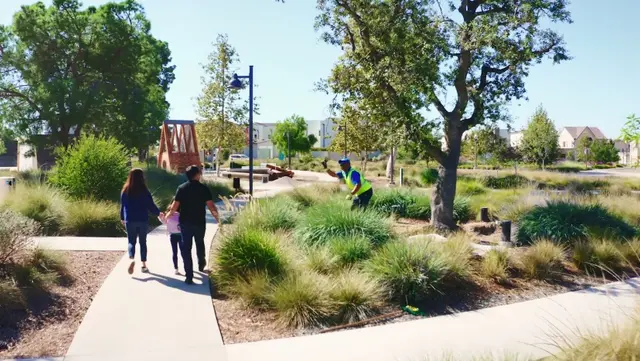 Landscape BrightView team members family trail