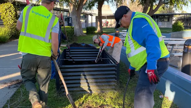Theaurkauf Elementary School students BrightView garden beds