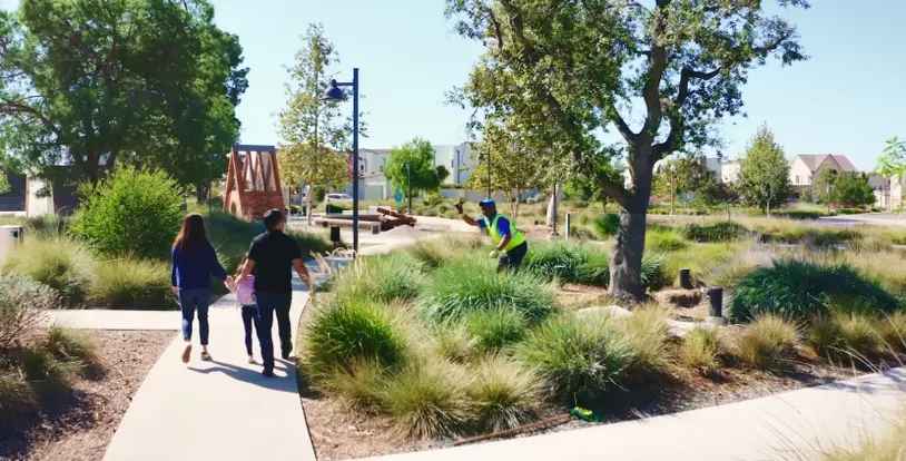 Landscape BrightView team members family trail