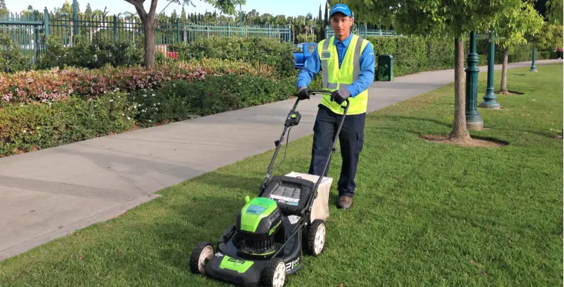 BrightView team member zero emission mower grass