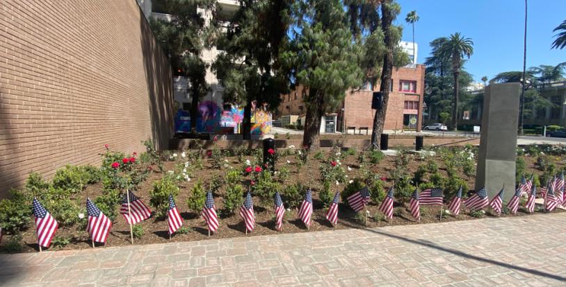 Riverside American flags landscaping roses